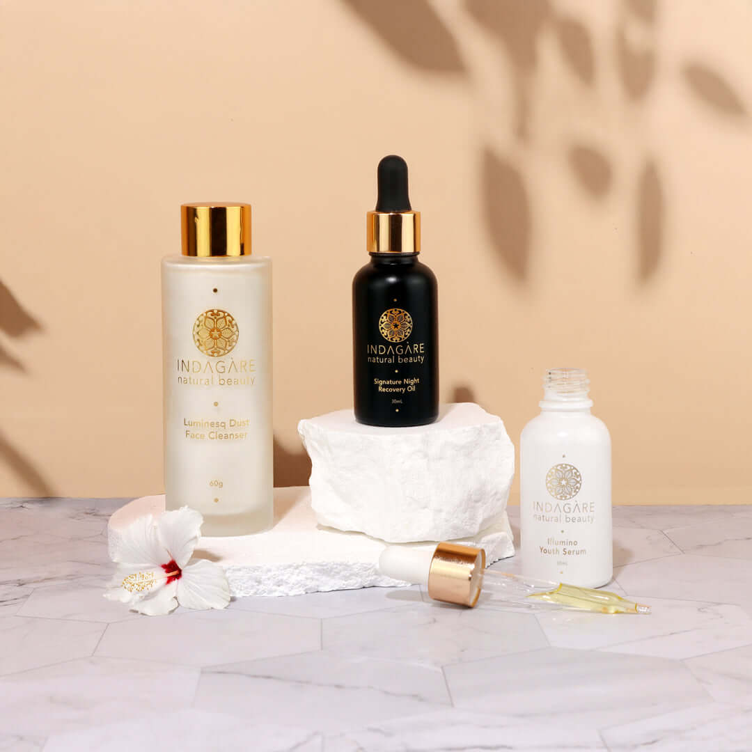 Stylish display of morning and night skincare set including cleanser and face oils