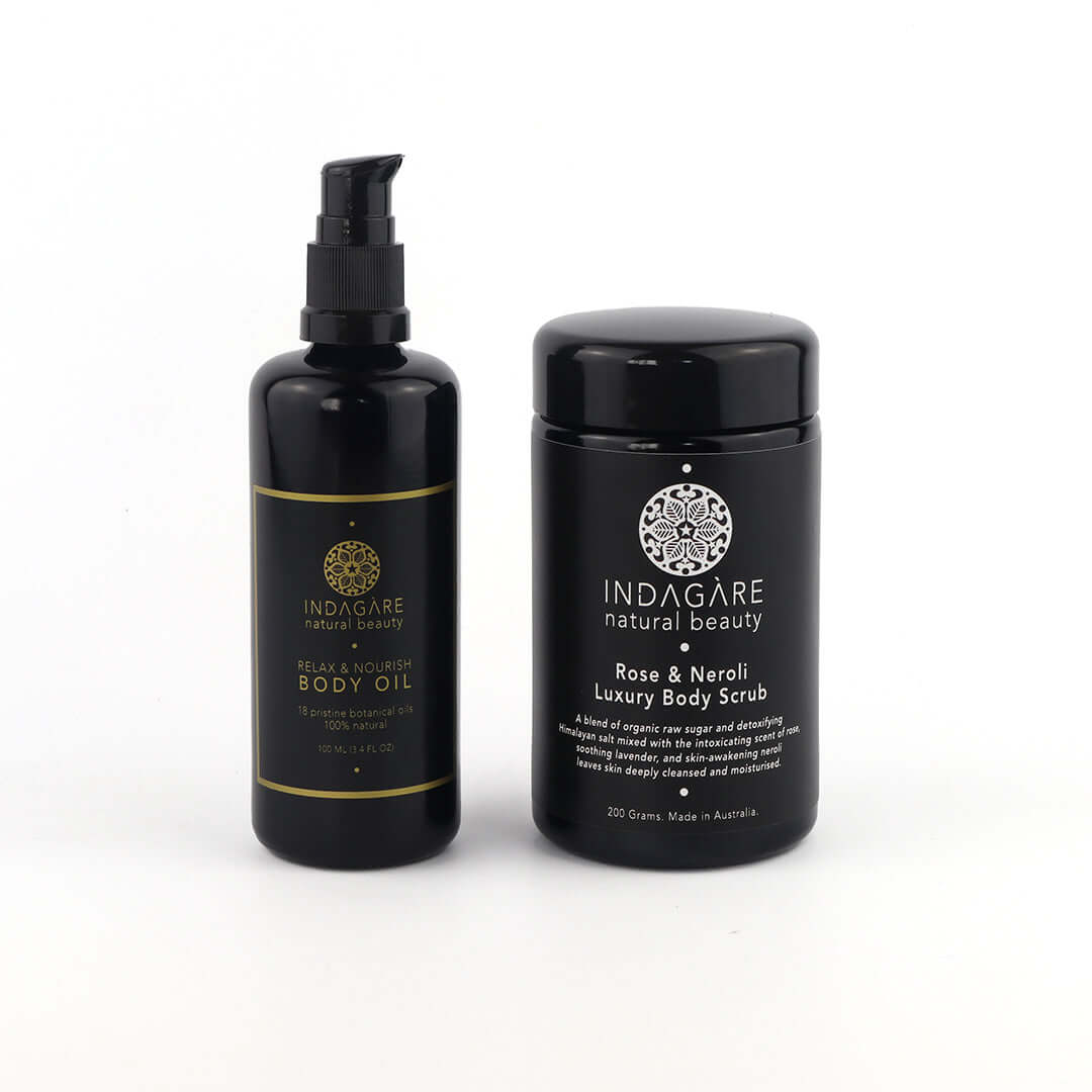 Body Bliss Set contains Indagare's Relax and Nourish Organic Body Oil and Rose and Neroli Luxury Body Scrub